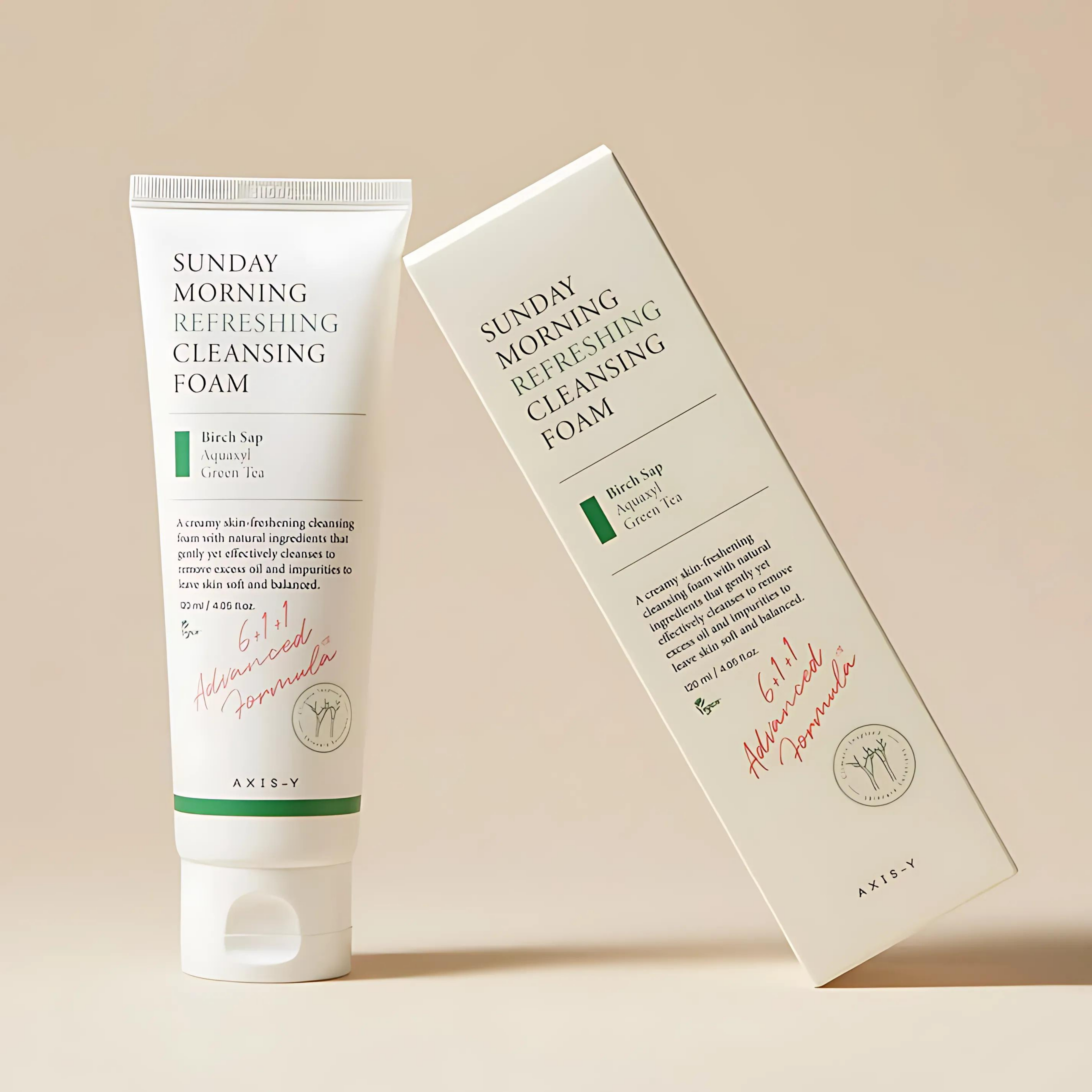 Tube and box of Sunday Morning Refreshing Cleansing Foam on a beige background