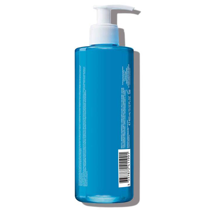 Blue bottle with pump on a white background
