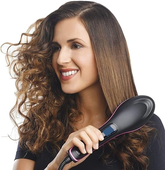 Woman with styled hair holding a hair straightener against a white background